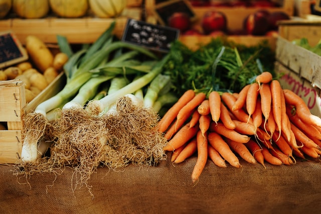 vegetables stacked on table to represent healthy eating