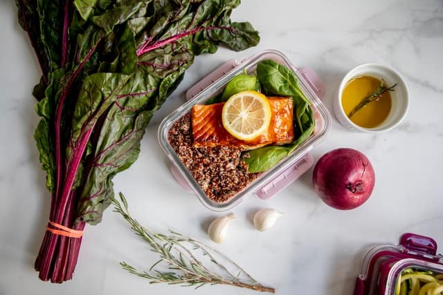 vegetables and container of meal prepped food