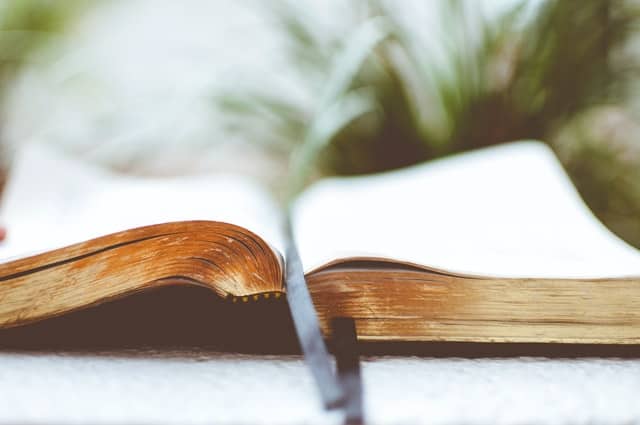 open bible with ribbon bookmark in it